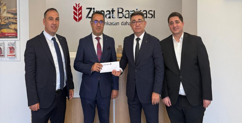 YİĞİT, BÖLGE BAŞKANI SÖZEN İLE DERECEYE GİREN ÜYEMİZİN EVLADININ ÖDÜLÜNÜ TAKDİM ETTİ